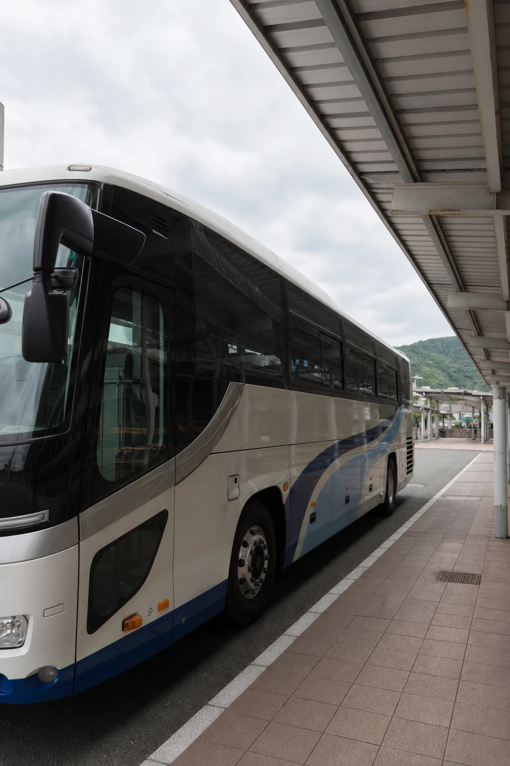 Coach beside a terminal platform