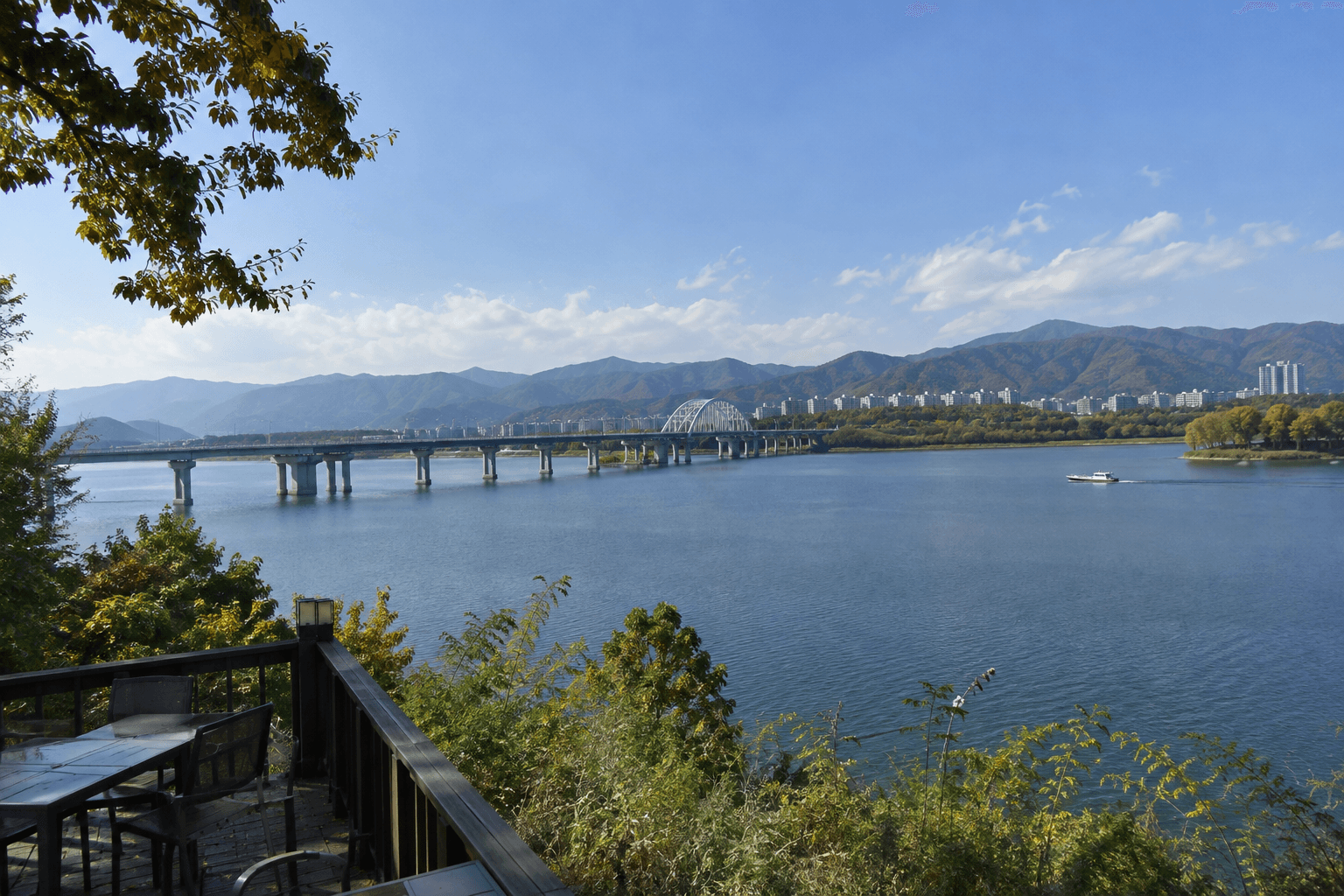 An example image of a cafe street in downtown Chuncheon looking over the lake