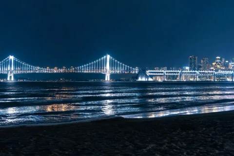 Gwangalli, with the Gwangandaegyo Bridge lights and night view spread over the night sea