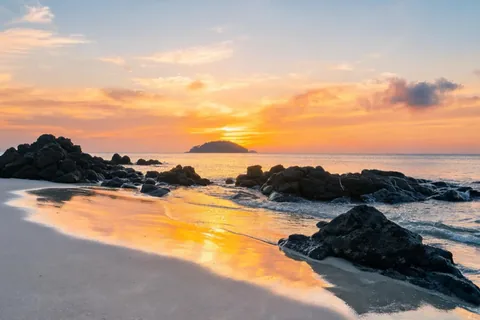 Illustrative autumn sunset on Jeju’s basalt coast