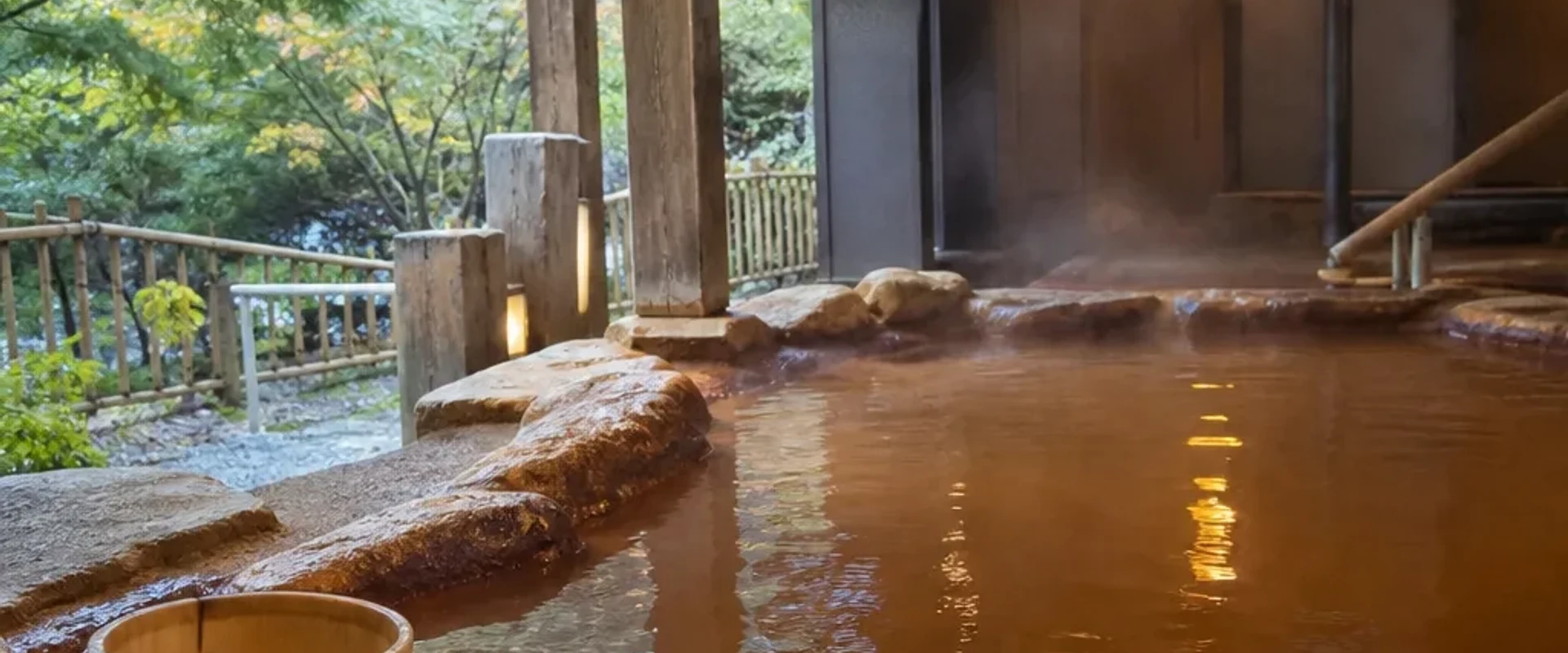 Reddish-brown spring water bath at Kin-no-Yu