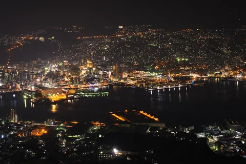 Nagasaki's harbour and city lights at night, seen from Mount Inasa