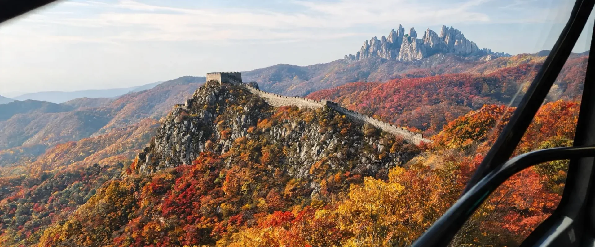 Illustrative Seoraksan cable car above an autumn ridge