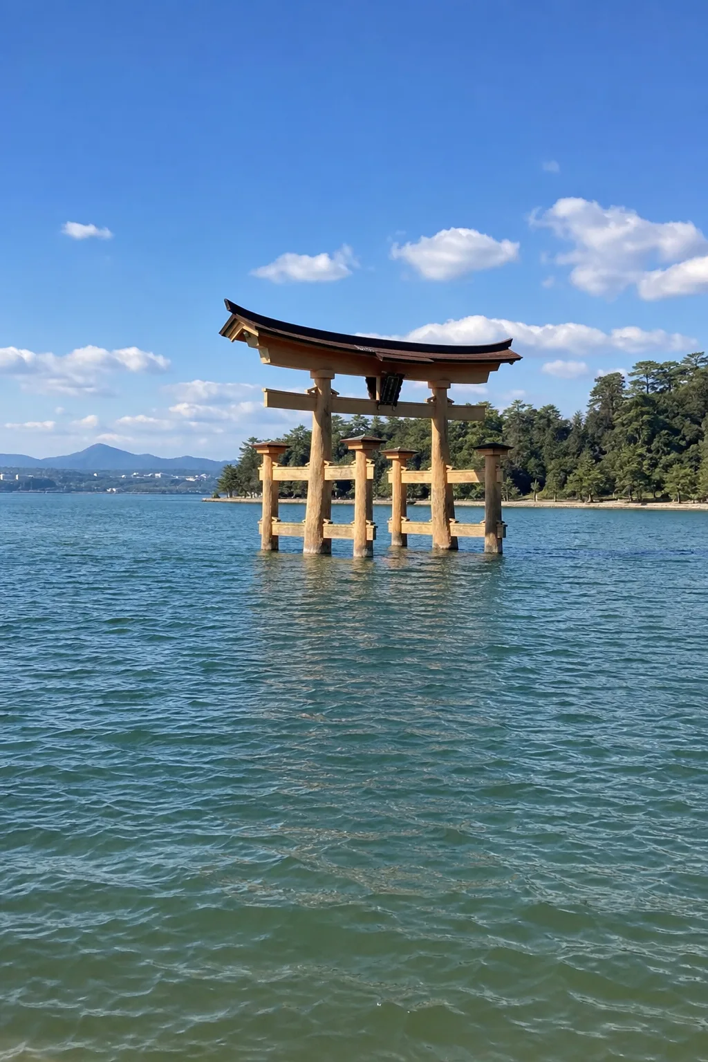 The great torii of Itsukushima Shrine appearing to float on the sea at high tide