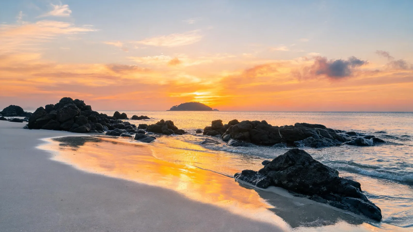 Autumn sunset and black basalt shore at Hyeopjae Beach