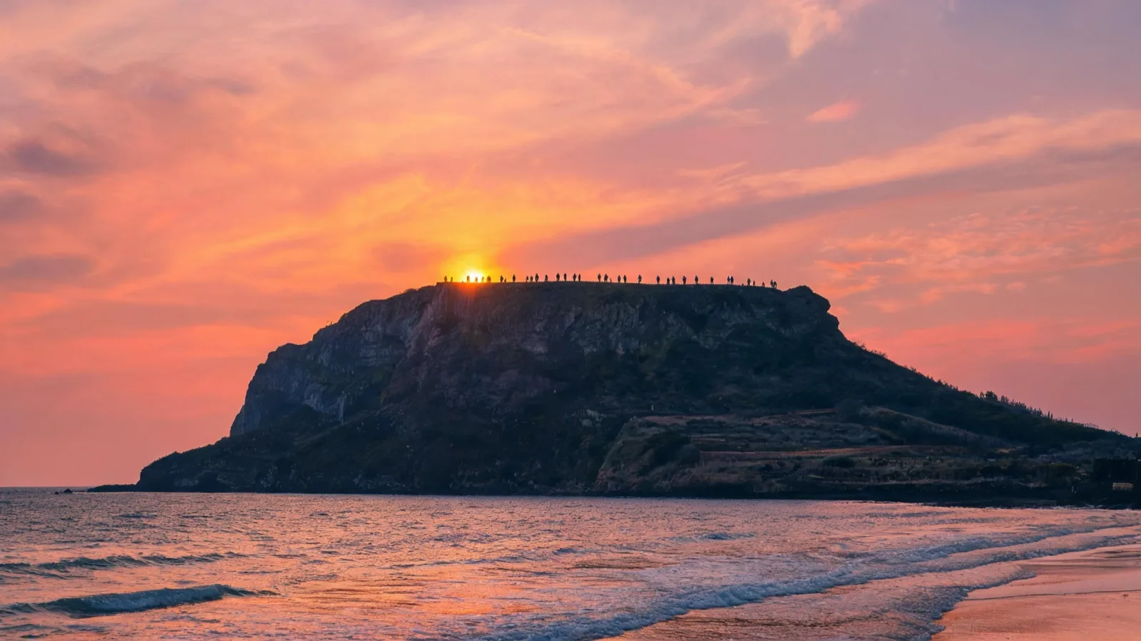 Winter sunrise rising over Seongsan Ilchulbong