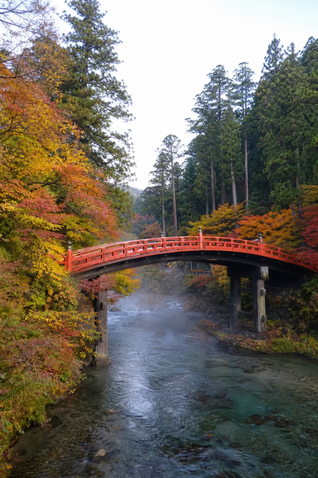 Shinkyo vermilion bridge over a mountain river